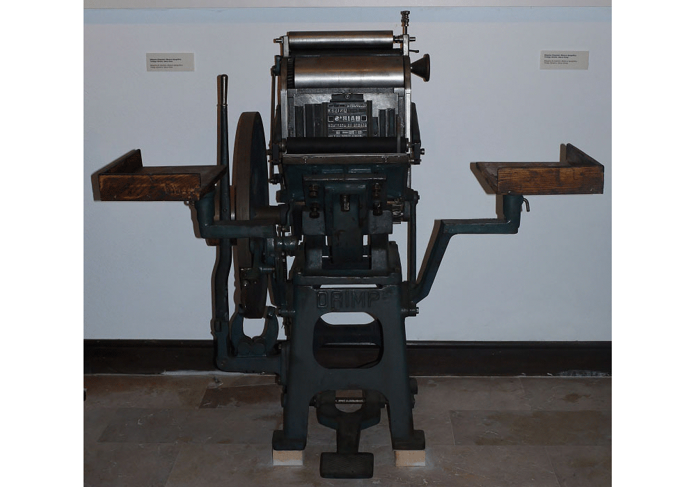 Máquina de imprimir Minerva tipográfica. Tintaje cilíndrico. Marca Drimp