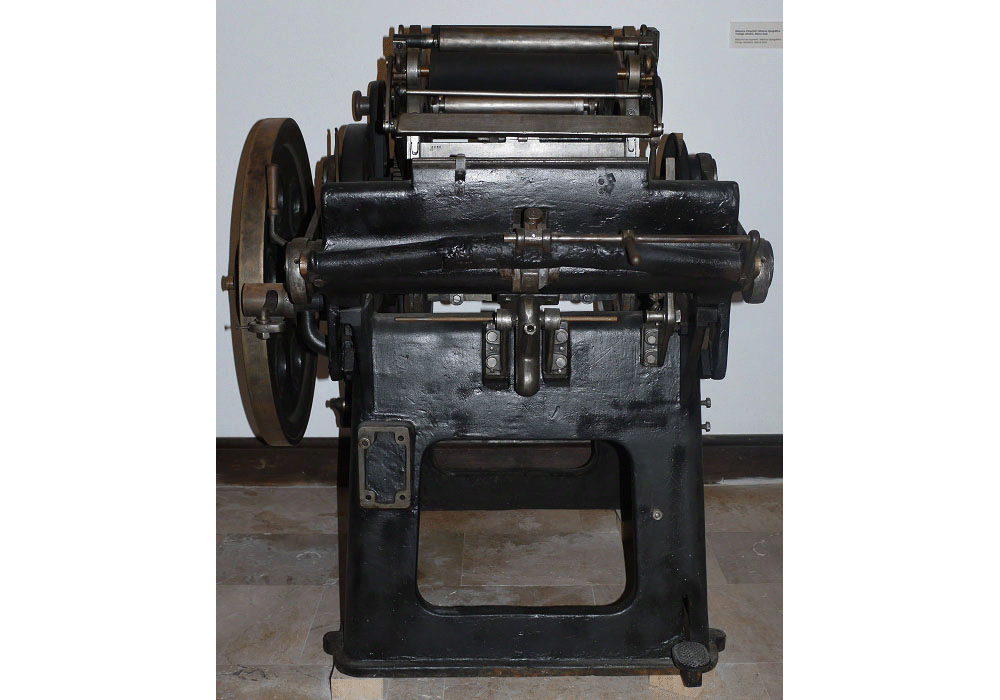Máquina de imprimir Minerva tipográfica. Tintaje cilíndrico. Marca Rota